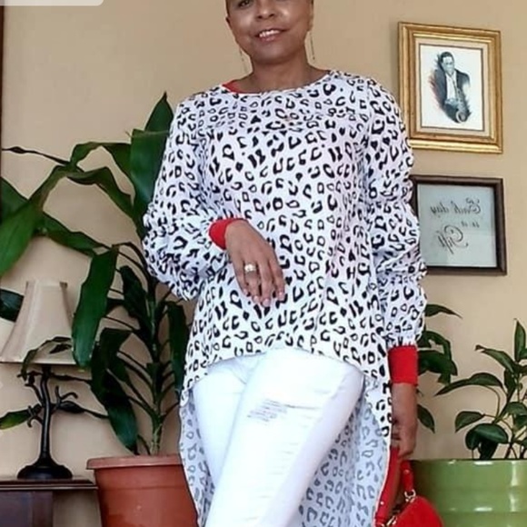 Boutique Tops - New Asymmetrica Fish tail animal print hi-low top